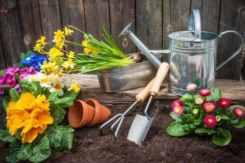 Segregated bins showing garden waste, food waste and dry recycling streams